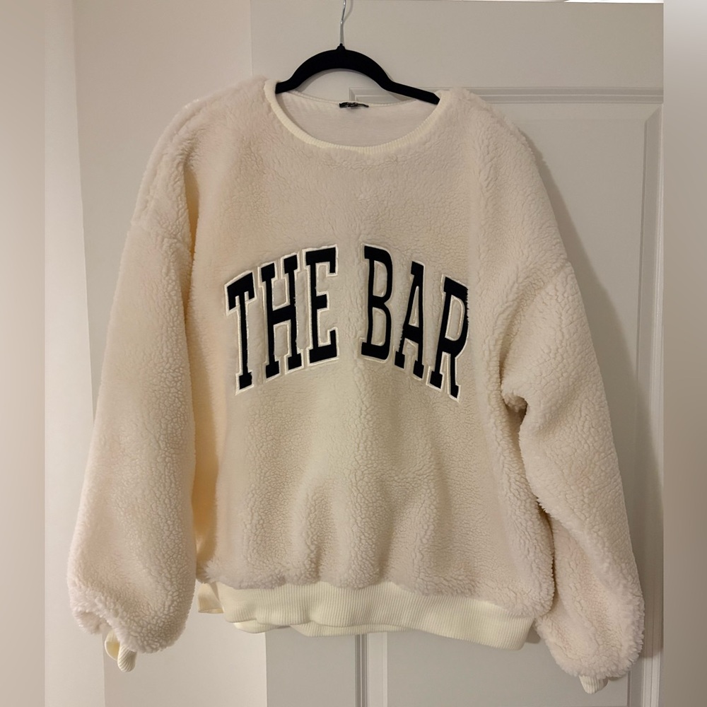 THE BAR Cream Sherpa Shearling Sweatshirt with Black Embroidered Lettering